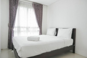 Comfort 1BR Apartment with Study Room at Woodland Park Residence By Travelio